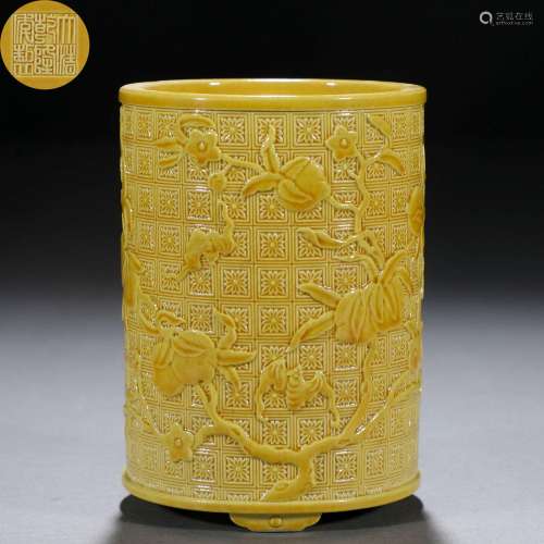 A Chinese Carved Porcelain Yellow Glaze Brushpot