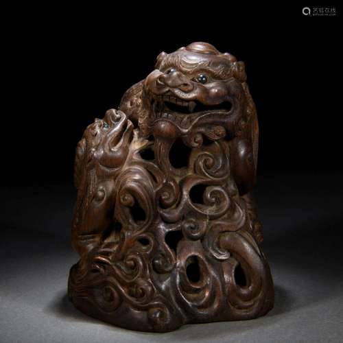 A Chinese Carved Aloeswood Mythical Beast