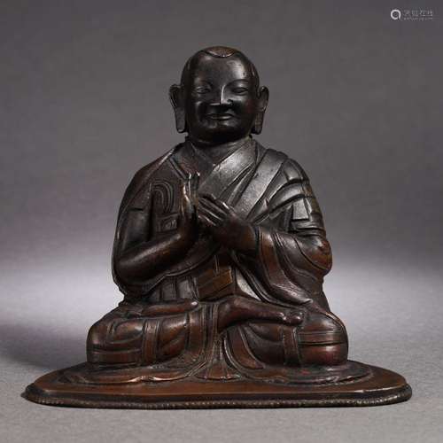 A Tibetan Bronze Figure of Lama Guru