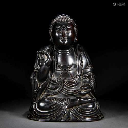 A Chinese Carved Rosewood Seated Buddha