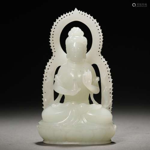 A Chinese Carved White Jade Seated Guanyin