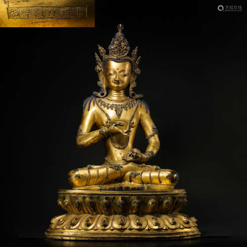 CHINA'S DAMING XUANDE PERIOD SEATED GILT-BRONZE BUDDHA STATU...