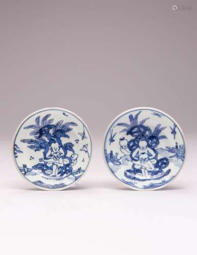A PAIR OF SMALL CHINESE BLUE AND WHITE `BOYS` DISHES WANLI 1...