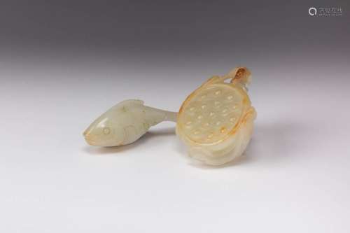 TWO CHINESE PALE CELADON AND RUSSET JADE CARVINGS 17TH/18TH ...
