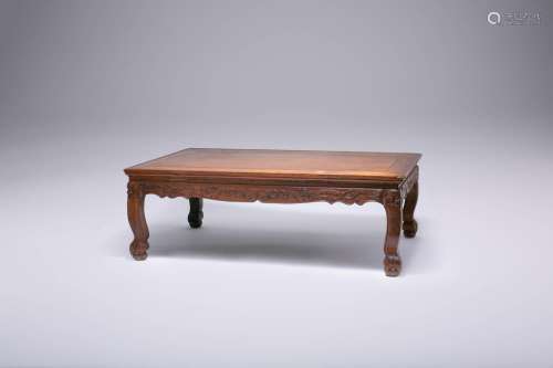 A CHINESE HUANGHUALI KANG TABLE QING DYNASTY The rectangular...