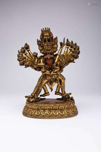 A LARGE CHINESE GILT-BRONZE FIGURE OF KAPALADHARA HEVAJRA QI...