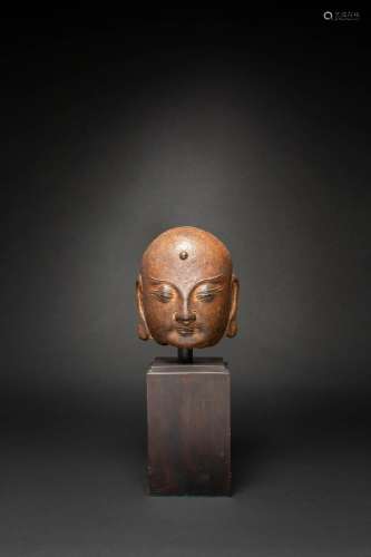 A CHINESE CAST IRON HEAD OF A LUOHAN MING DYNASTY The face w...