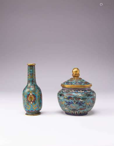 A CHINESE CLOISONNE ENAMEL BOTTLE VASE AND A JAR AND COVER Q...