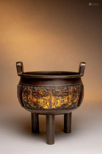 A MASSIVE CHINESE ARCHAISTIC PARCEL-GILT BRONZE TRIPOD INCEN...