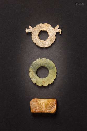 THREE CHINESE ARCHAIC JADE ORNAMENTS WESTERN ZHOU AND EASTER...