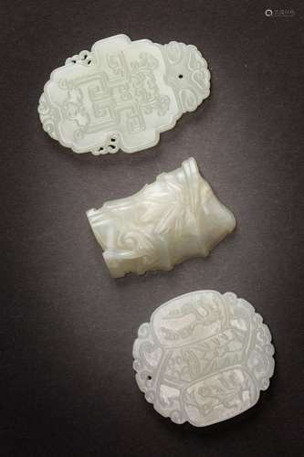 TWO CHINESE JADE PENDANTS AND A PLAQUE QING DYNASTY OR LATER...