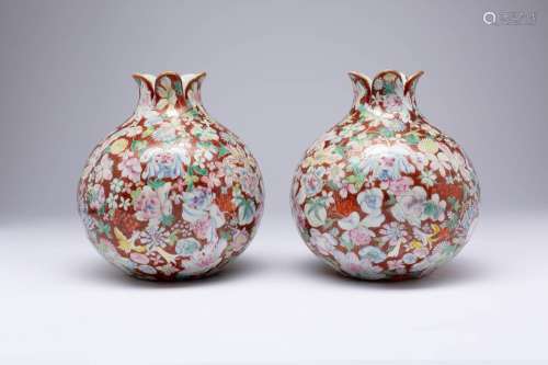 A PAIR OF FAMILLE ROSE MILLEFLEURS POMEGRANATE-FORM VASES, S...