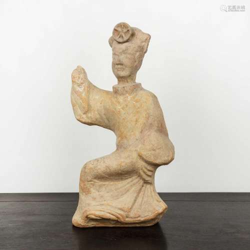 Large unglazed figure Chinese, probably Tang depicted wearin...