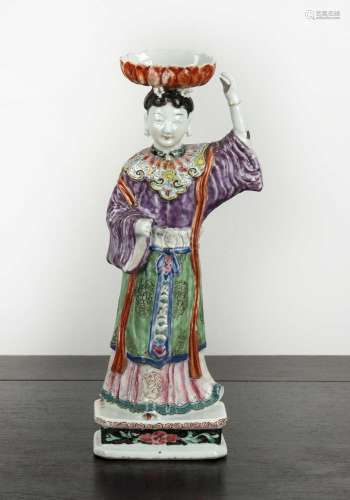 Famille rose candleholder in the form of a standing figure C...