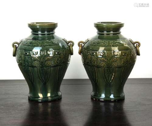 Pair of green ground archaic porcelain vases Chinese, 19th/2...