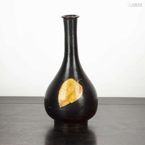 Cizhou style vase Chinese with two moulded leaves to the cen...