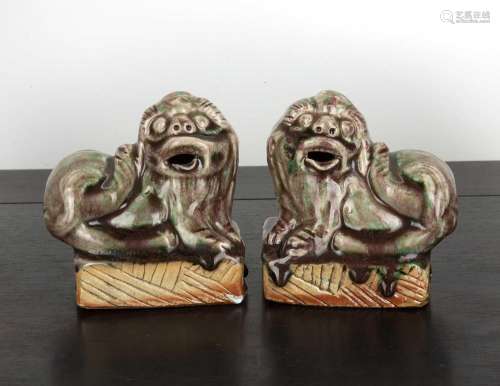 Pair of glazed guardian lions Chinese, 20th Century modelled...