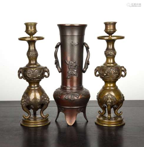 Pair of bronze candlesticks Chinese, 19th Century with flora...