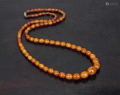 Amber bead necklace of graduated form, 74cm longPlease note ...