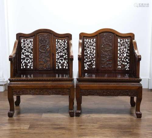 Pair of Ming-style carved hardwood armchairs Chinese, 19th C...