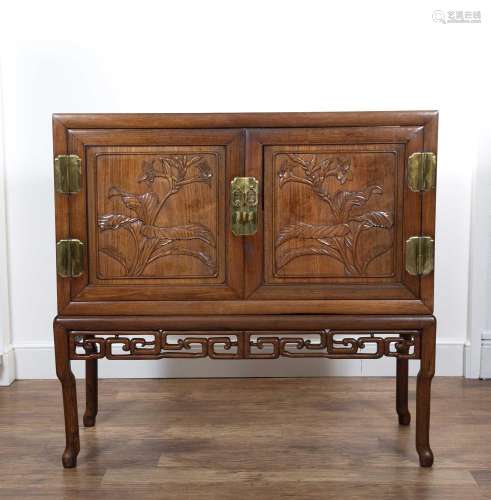 Carved and incised cabinet on stand Chinese, 19th Century wi...