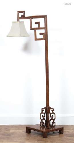Hardwood standard lamp Chinese, late 19th Century with a car...