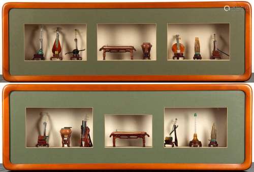 Pair of framed cases containing miniature traditional musica...