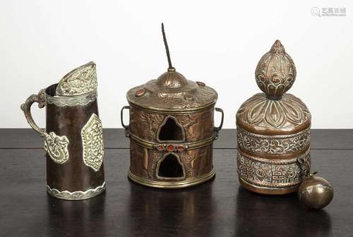 Two prayer wheels Tibetan and a Tibetan monks drinking vesse...