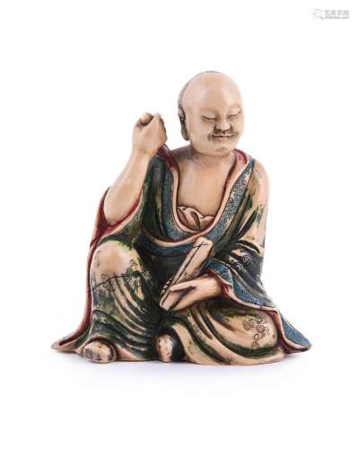 A Chinese soapstone figure of a luohan