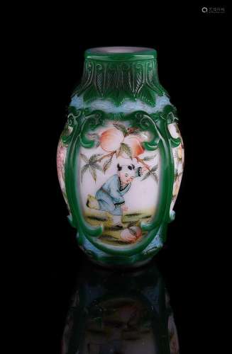A green and blue glass overlay snuff bottle