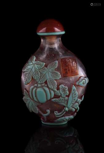 A Chinese green overlay glass snuff bottle