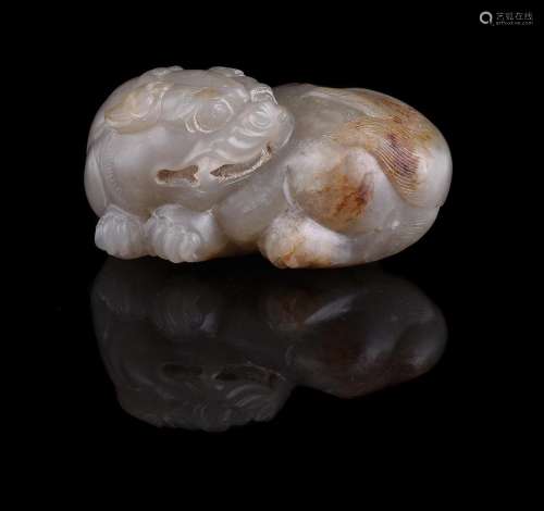 A Chinese celadon jade paper weight of a mythical beast