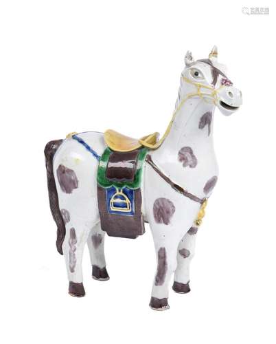 A Chinese porcelain model of a piebald horse