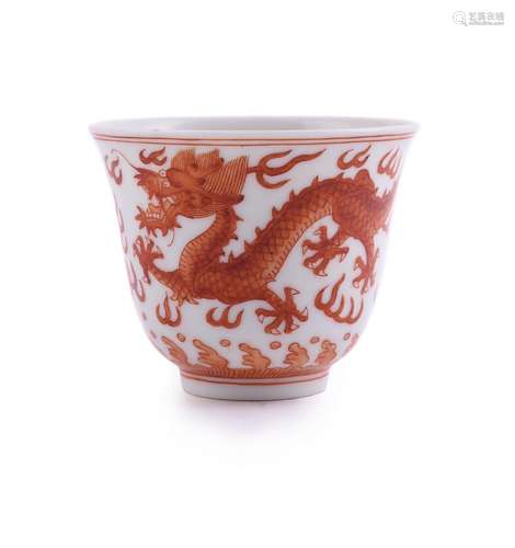 A Chinese iron red 'Dragons' wine cup