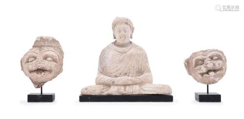 A Gandhara stucco figure of a Buddha