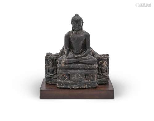 An Early Pala Black Basalt Figure of Buddha