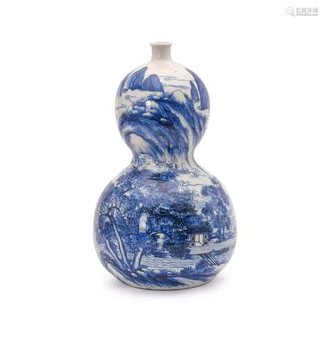 A Japanese blue and white double gourd vase