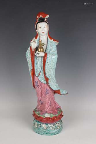 A Chinese famille rose enamelled porcelain figure of Guanyin