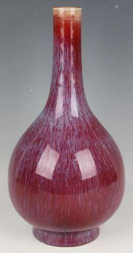 A Chinese flambé glazed porcelain bottle vase