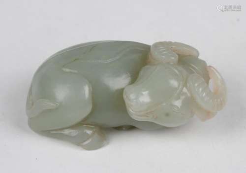 A Chinese pale celadon jade carving of a water buffalo