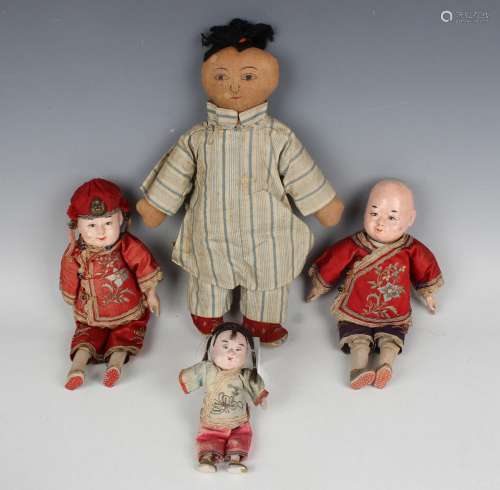 A group of three Chinese opera dolls