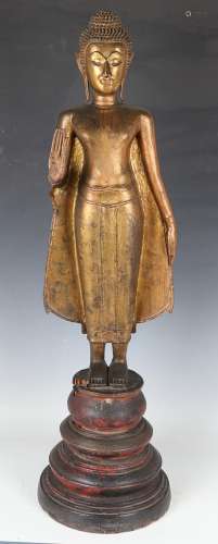 A Thai gilt bronze figure of a standing Buddha