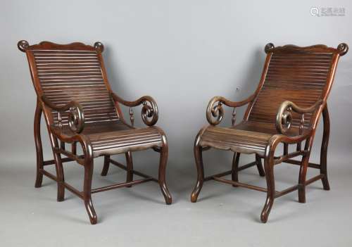 A pair of Chinese hardwood moon-gazing armchairs