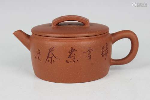 A Chinese Yixing stoneware teapot and cover