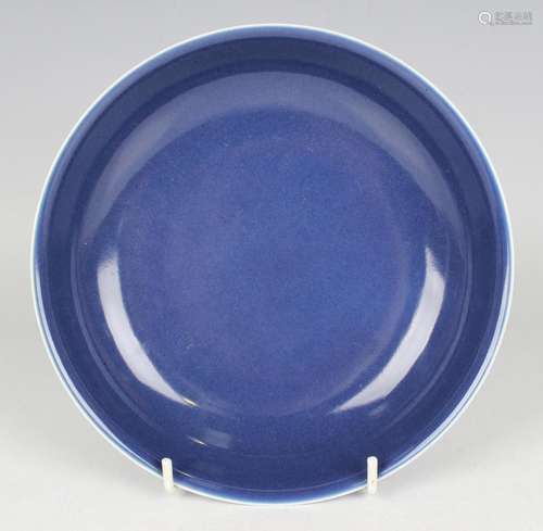 A Chinese blue monochrome glazed porcelain saucer dish