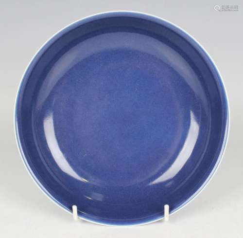 A Chinese blue monochrome glazed porcelain saucer dish