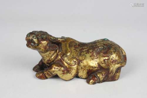 A Chinese gilt bronze figure of a reclining water buffalo