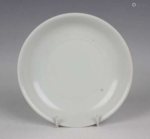 A Chinese white glazed anhua decorated porcelain saucer dish