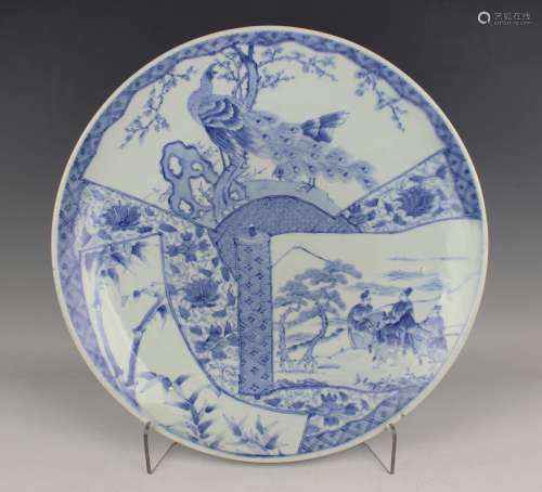 A Japanese Arita blue and white porcelain circular charger