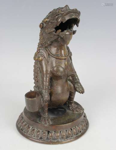 A Chinese brown patinated bronze figure of a mythical beast